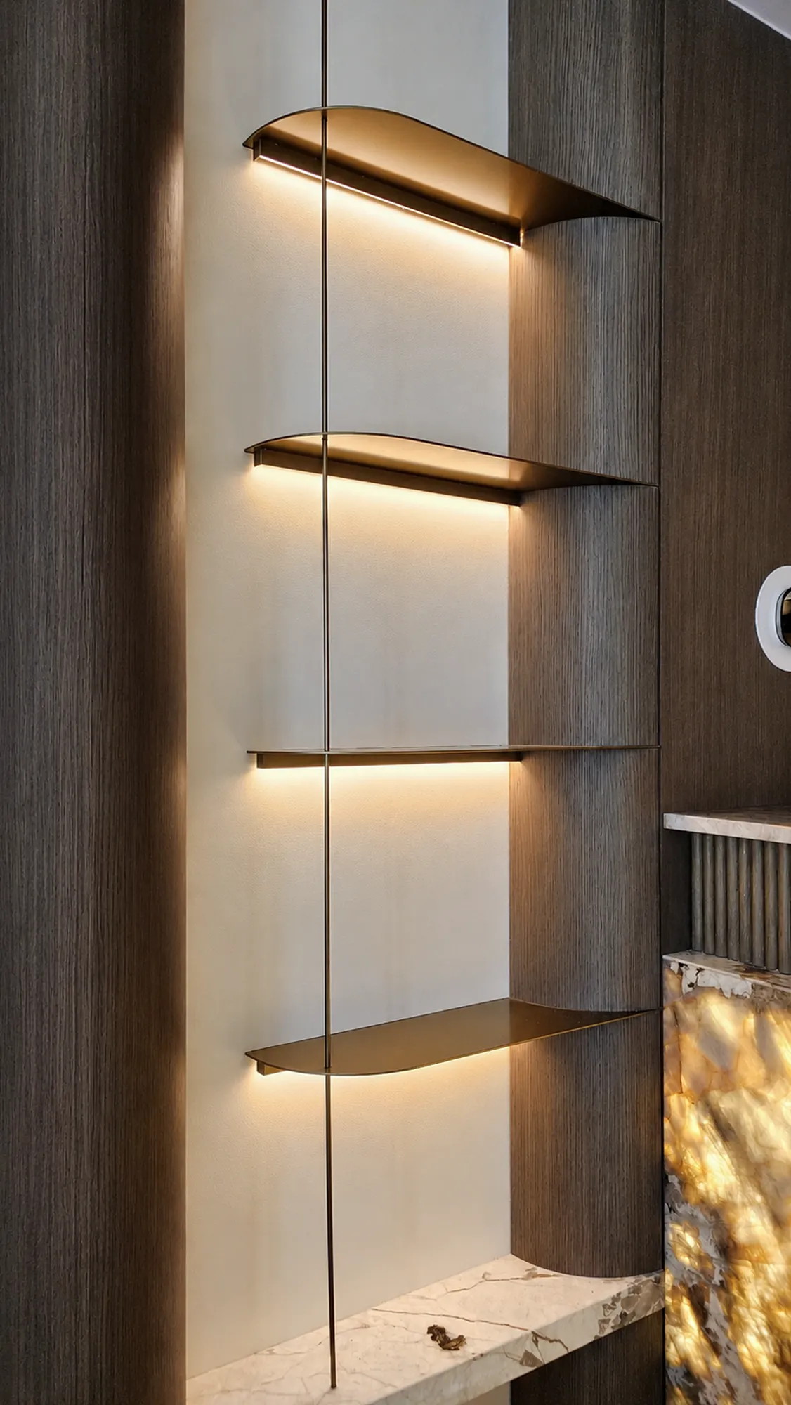 Lounge, backlit brass shelves — apartment interior in Dubai by Soltis Interiors